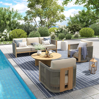 Outdoor patio set with furniture and decor by a pool