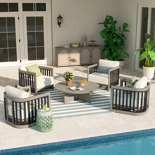 Outdoor patio set with furniture and decor by a pool