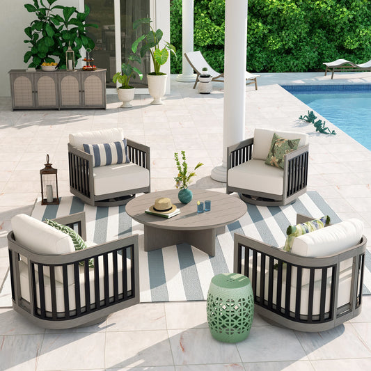Outdoor patio furniture set with chairs, table, and decorative elements by a pool.