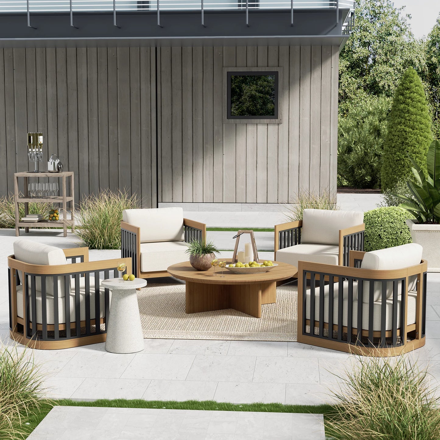 Outdoor patio set with wooden chairs and table in a modern garden setting.