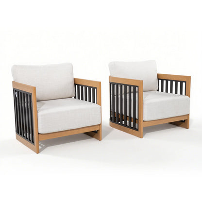 Two wooden armchairs with white cushions 