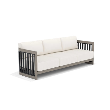 Sofa with white cushions and a dark wooden frame