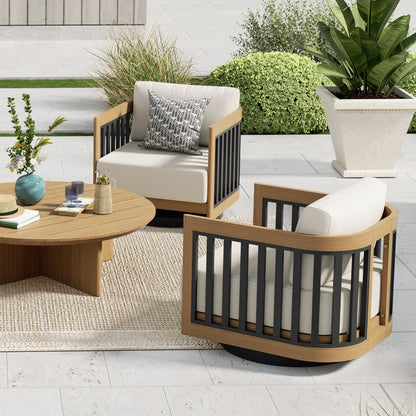 Outdoor patio set with wooden chairs and table on a patio with plants and rug.