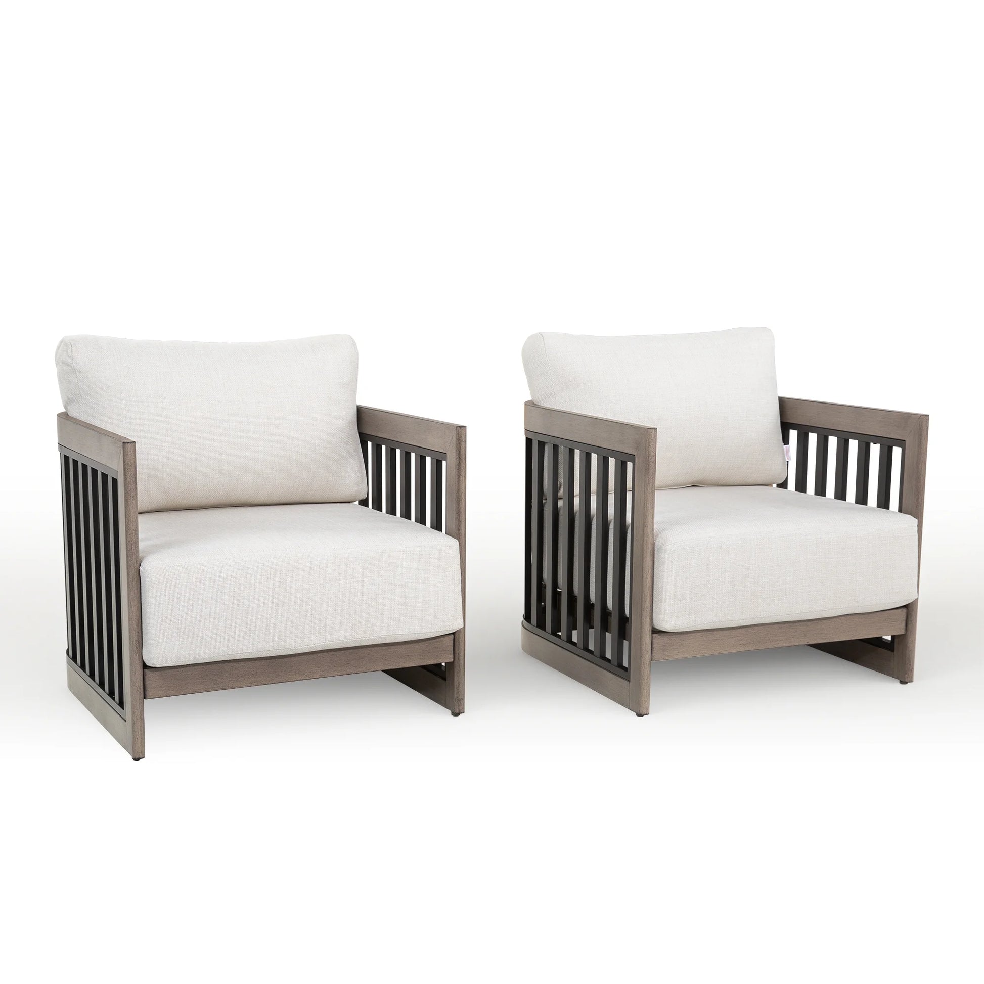 Two patio armchairs with white cushions