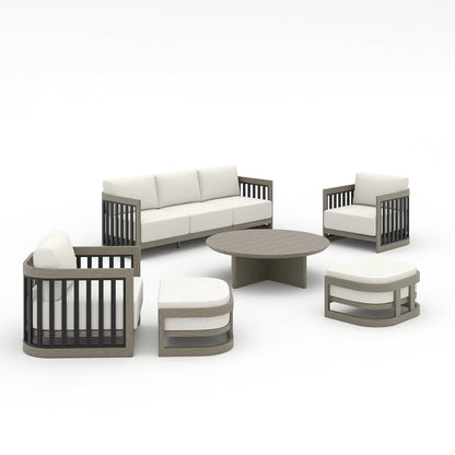 A 6-piece outdoor patio conversation set featuring a three-seat sofa, two armchairs, a round coffee table, and two ottomans, in a modern gray frame with off-white cushions, shown on a white background.
