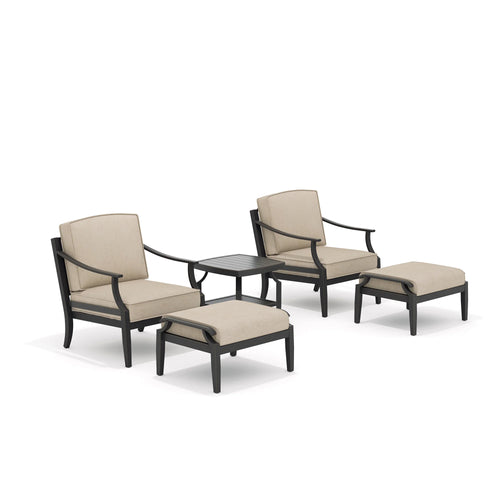 Outdoor furniture set with two chairs, a table, and two ottomans