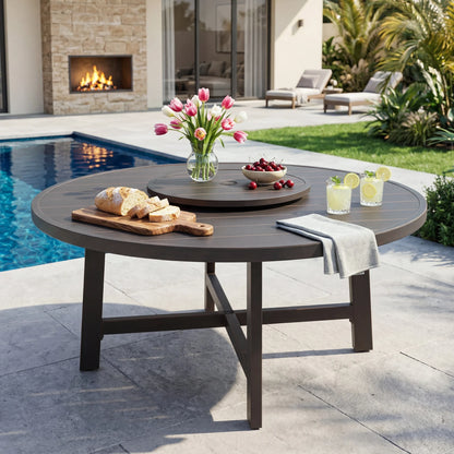 Outdoor patio table with food and drinks by a pool
