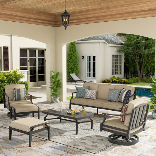 Outdoor patio set with furniture and decor on a stone patio.