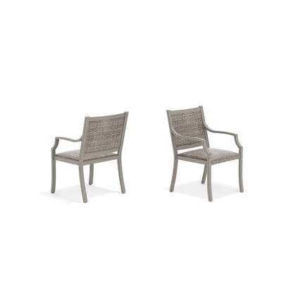 Two gray wicker chairs 