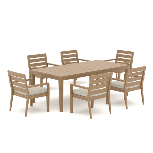 Alcudia 7-piece aluminum patio dining set showcasing six classic stationary armchairs neatly arranged around a rectangular wood-look metal table on a white background.
