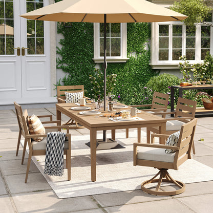 Alcudia 7-piece mixed seating patio set showcasing 4 stationary side chairs, 2 swivel rocker end-chairs, and a large beige market umbrella over the table.