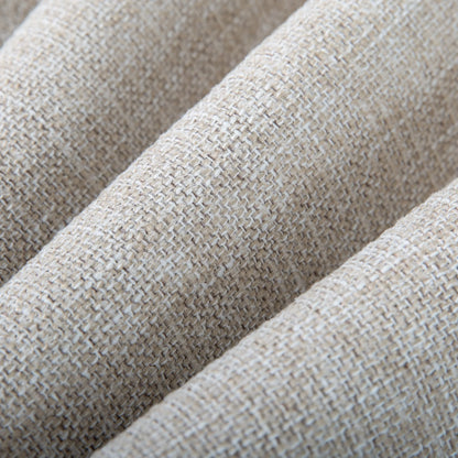 Macro close-up texture of the Alcudia patio chair cushion showcasing the high-quality woven texture of the beige solution-dyed spun polyester fabric.