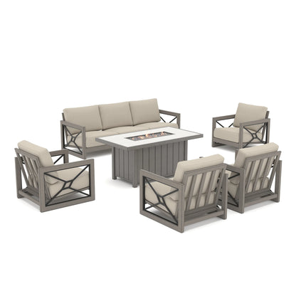 Studio product shot of the estate-sized Marindo patio deep seating set isolated on a white background, featuring four club chairs and a sofa arranged around a lit propane fire table with active flames.