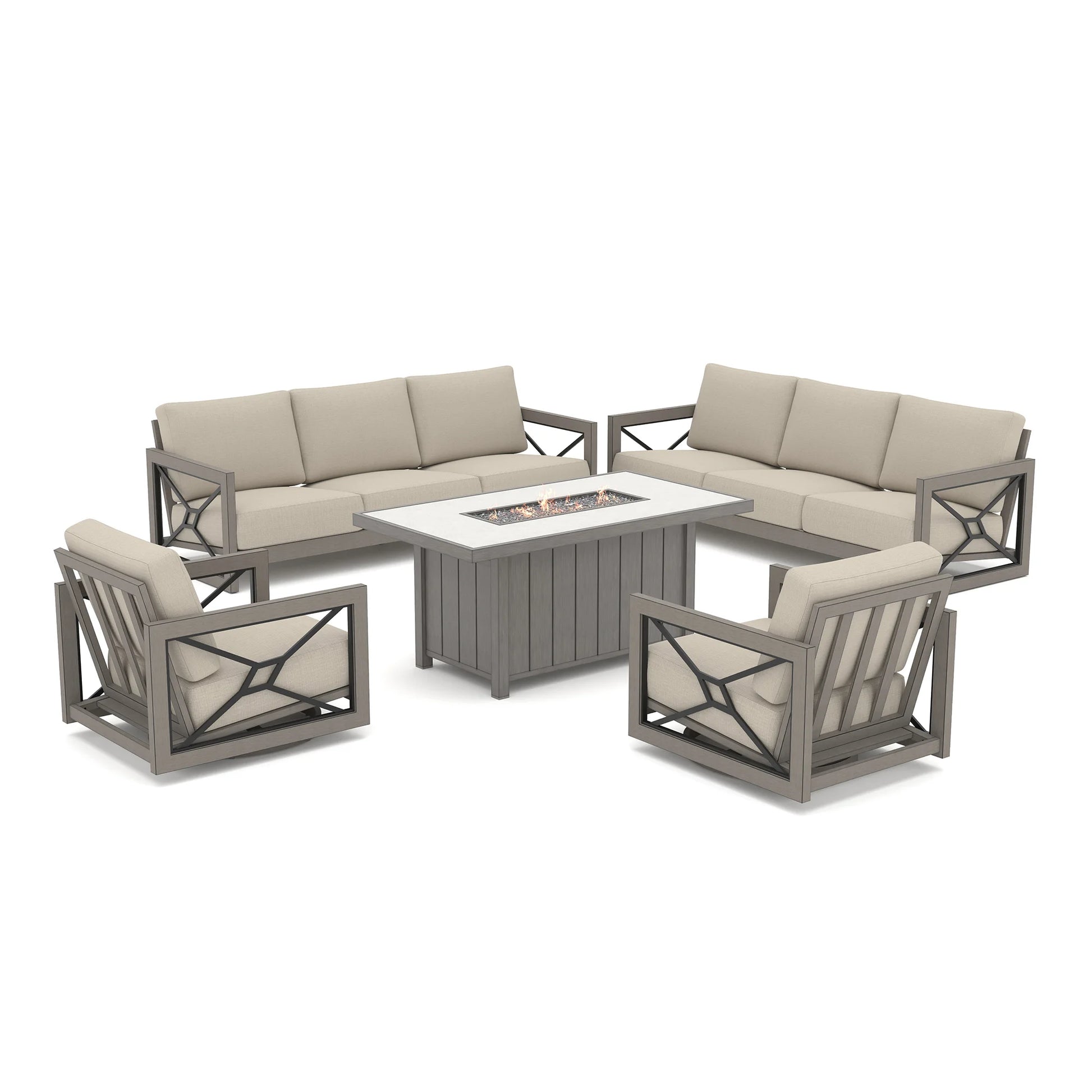 Isolated product shot of the grand Marindo patio deep seating collection against a white background, showcasing active amber flames on the propane fire pit surrounded by two sofas and two swivel chairs.