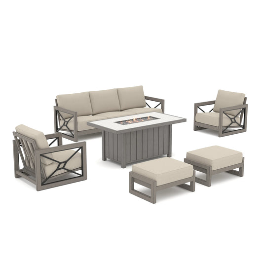 Studio product shot of the Marindo 6-piece wood-look deep seating set isolated on a white background, displaying an active flame on the propane fire pit table with matching club chairs and dual ottomans.