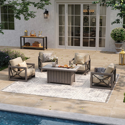 A bright resort-style poolside terrace providing backyard gathering inspiration, highlighting the Marindo 4-person wood-look aluminum seating layout with stationary club chairs over a white patterned rug during the day.