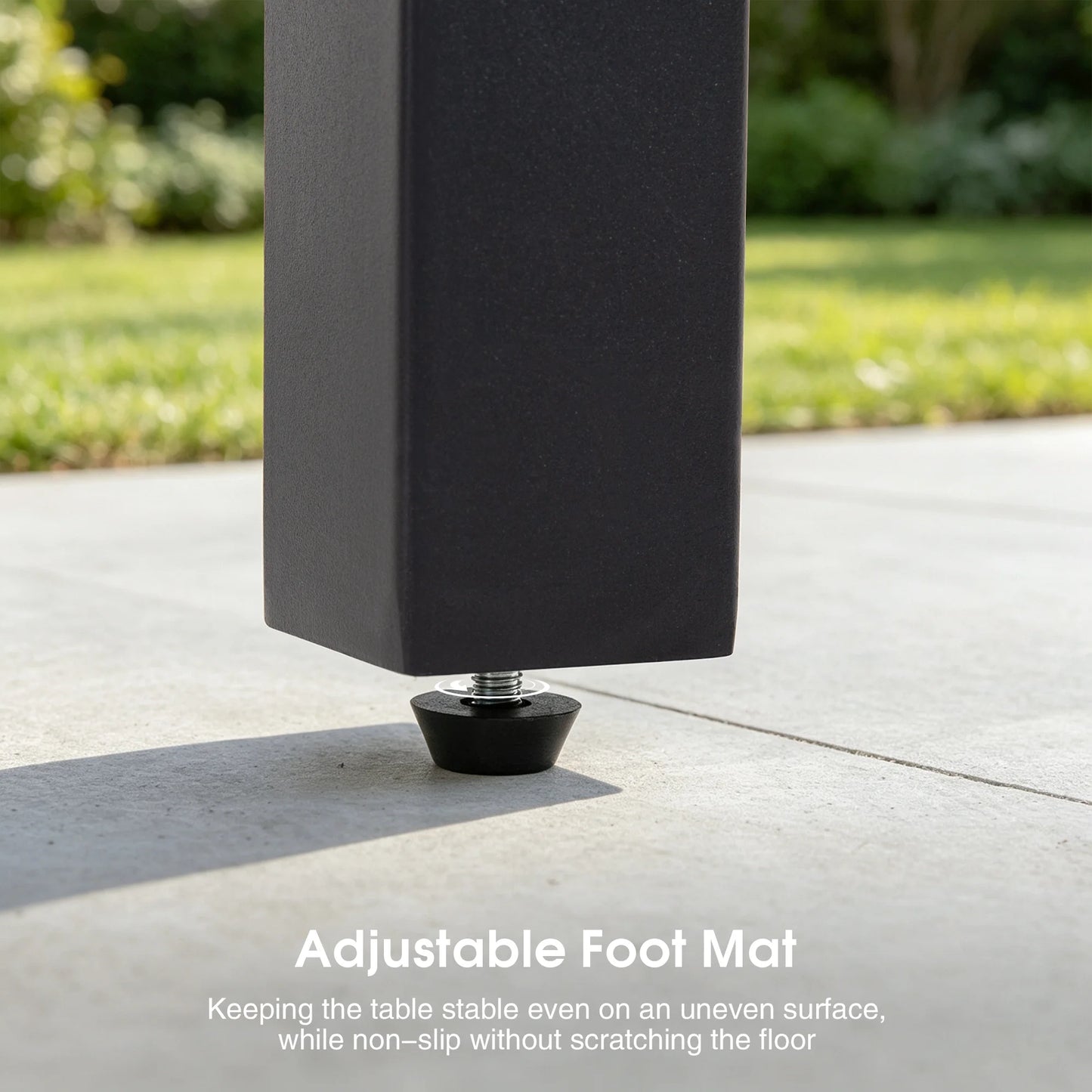 Close-up of the adjustable non-slip leveling foot mat on the Saporta table leg, demonstrating stability on uneven ground.